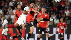 European football: Torres double rescues PSG point after Rennes threaten shock win