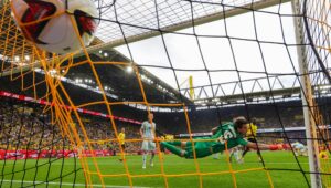 European football: Dortmund win again but Freiburg top after Gladbach rout