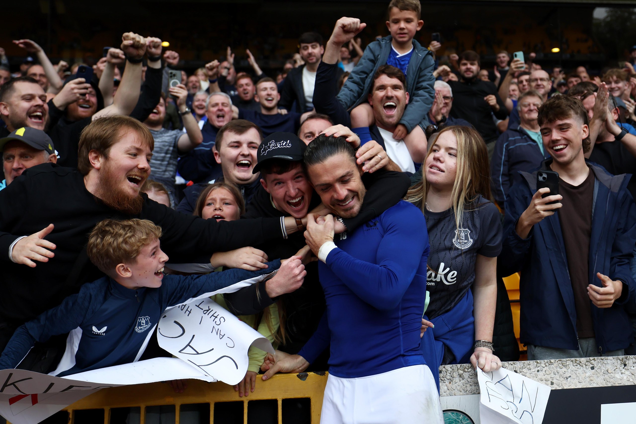 Jack Grealish celebrates with Everton fans