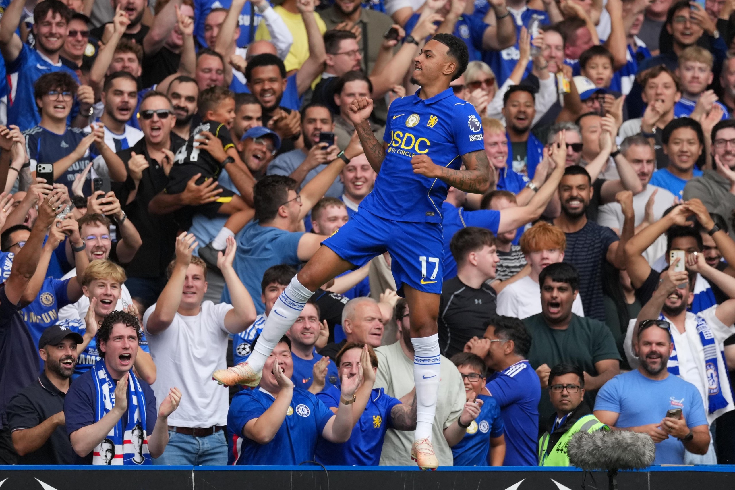 Morgan Rogers and the Chelsea fans celebrate after he put the home side ahead against Hull.