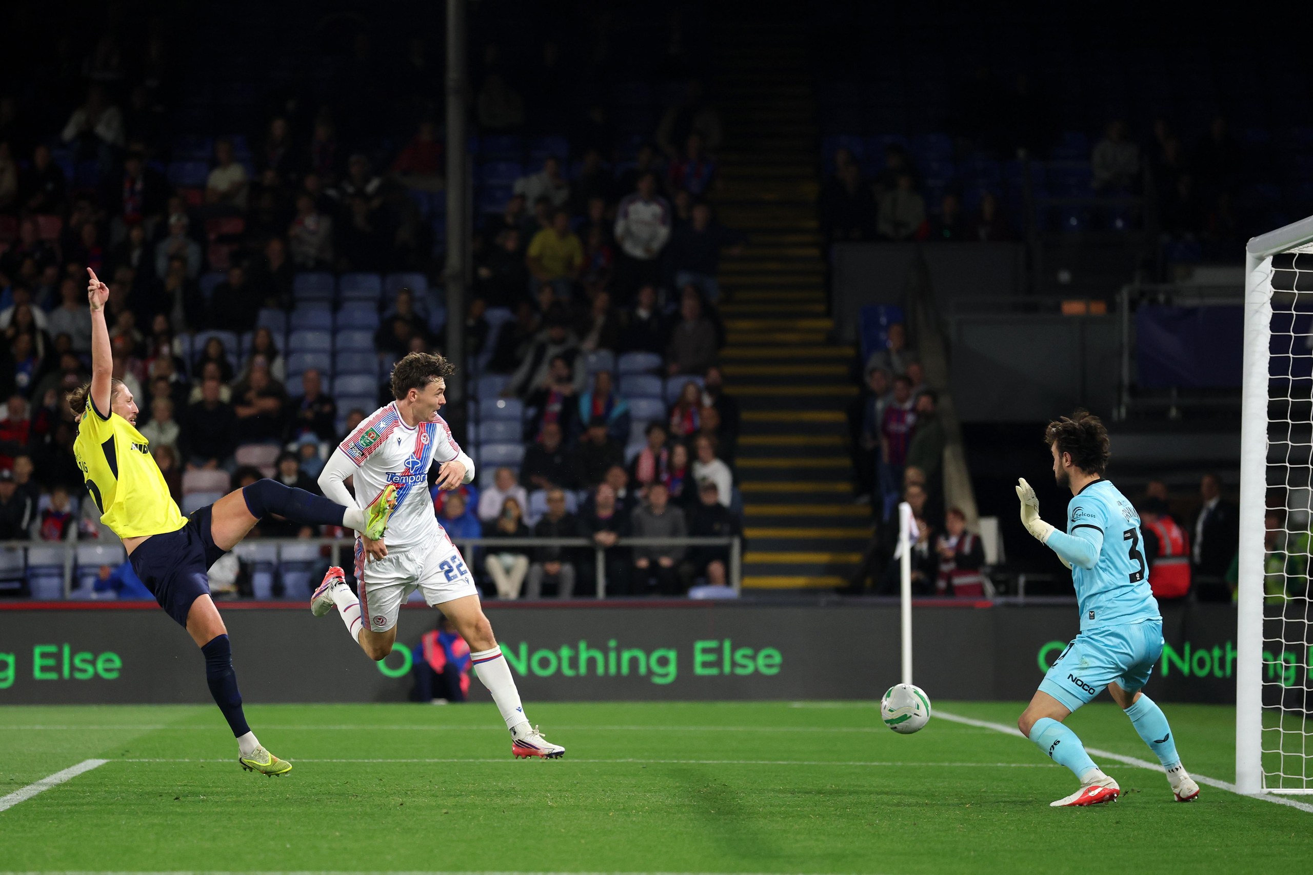 Jorgen Strand Larsen of Crystal Palace scores his team’s first goal past Boro keeper Sol Brynn.