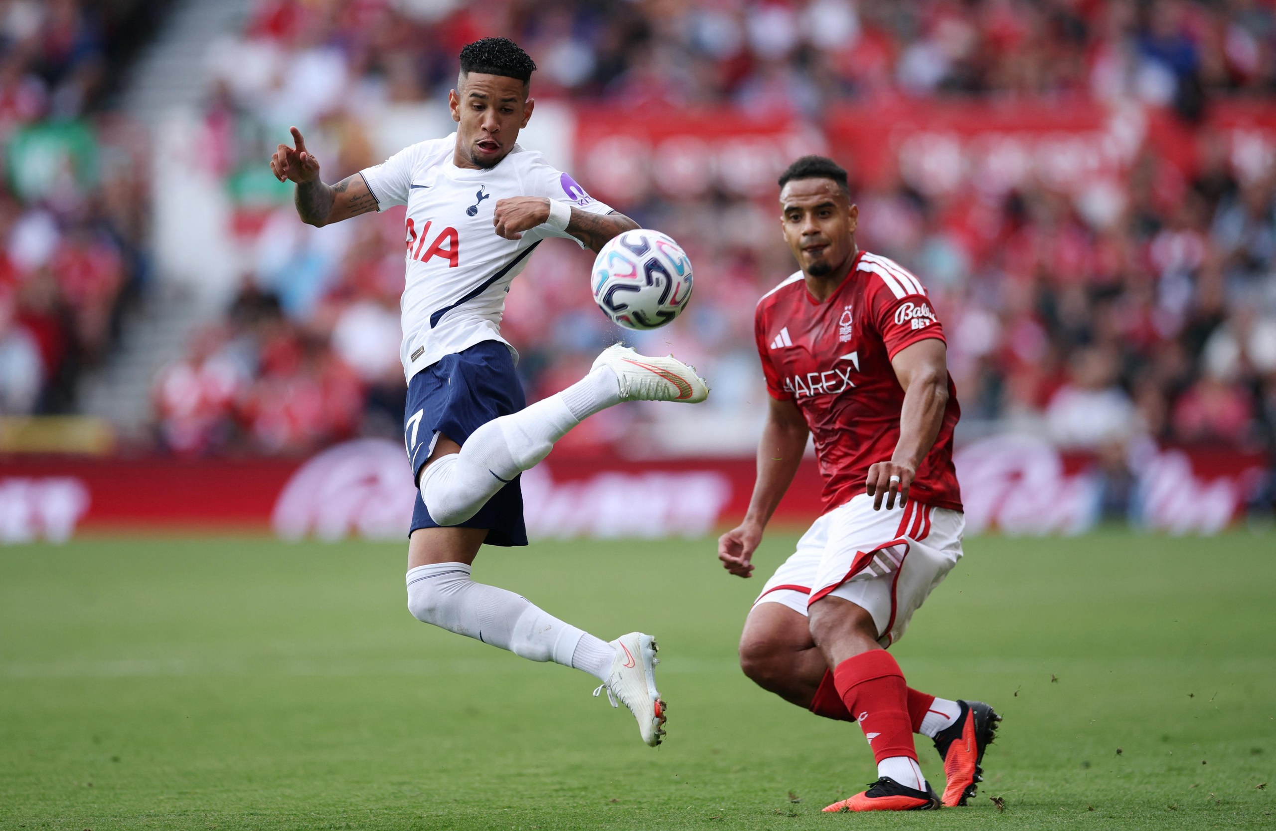 Tottenham’s Savio flicks the ball in the air