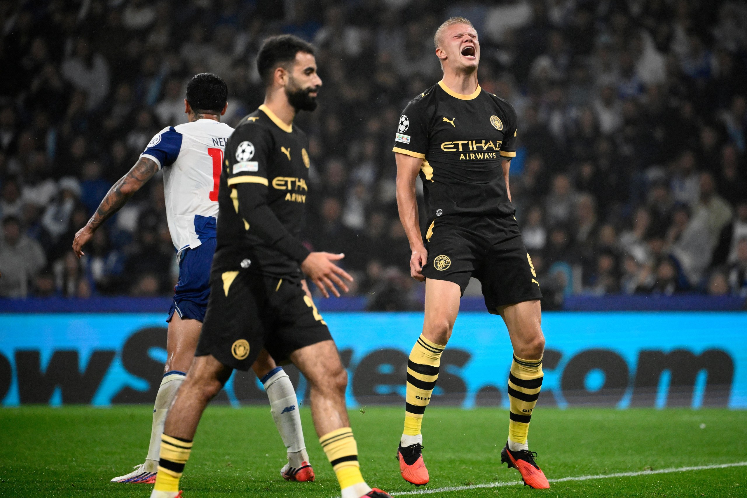 Manchester City's Erling Haaland reacts to missing a goal opportunity.